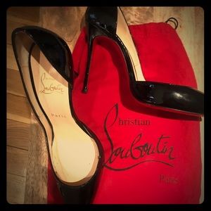 Louboutin half d’orsay black pumps